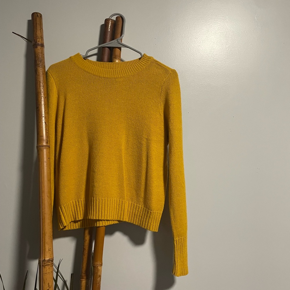 Yellow knitted sweater